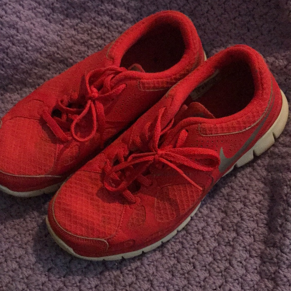 Red orange Nike shoes
